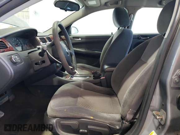 2009 Chevrolet Impala LS with VIN 2G1WB57N691128496, listed as a Copart auction lot 54211565 with 247,617 mi miles and Salvage Title. Bid and sale history available at DreamBid. Image 7.