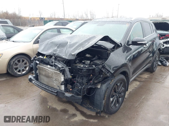 2018 Kia Sportage EX with VIN KNDPNCAC4J7409914, listed as a IAAI auction lot 41654833 with 142,057 mi miles and . Bid and sale history available at carsss.com. Image 6.