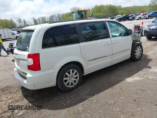 2014 Chrysler Town & Country Touring z VIN 2C4RC1BGXER207409, wystawiony jako IAAI lot #42190100 z przebiegiem 212 088 mil mil oraz . Historia ofert i sprzedaży dostępna na DreamBid. Obrazek 4.