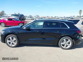 2019 Audi e-tron Premium Plus with VIN WA1LAAGE9KB021724, listed as a IAAI auction lot 41643596 with 34,804 mi miles. Bid and sale history available at carsss.com. Image 14.