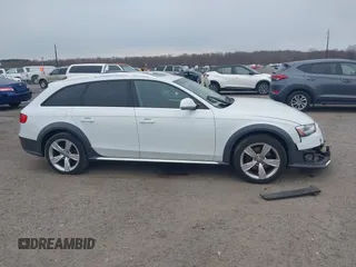 2016 Audi allroad Premium Plus with VIN WA1UFAFL5GA010559, listed as a IAAI auction lot 41918324 with 138,499 mi miles. Bid and sale history available at carsss.com. Image 14.