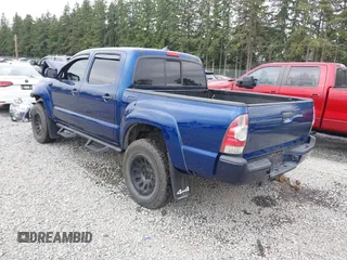 2015 Toyota Tacoma with VIN 3TMLU4EN1FM186747, listed as a IAAI auction lot 42493658 with 104,100 mi miles and . Bid and sale history available at DreamBid. Image 3.