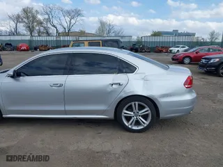 2012 Volkswagen Passat SE w/Sunroof with VIN 1VWBM7A32CC100678, listed as a IAAI auction lot 41925484 with 154,373 mi miles. Bid and sale history available at carsss.com. Image 6.