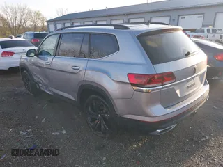 2023 Volkswagen Atlas SE with VIN 1V2HR2CA6PC523233, listed as a IAAI auction lot 41952399 with 28,387 mi miles and . Bid and sale history available at DreamBid. Image 3.