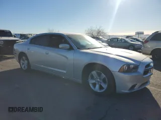 2012 Dodge Charger SE with VIN 2C3CDXBG7CH214766, listed as a Copart auction lot 42142695 with 163,208 mi miles and Salvage Title. Bid and sale history available at DreamBid. Image 4.
