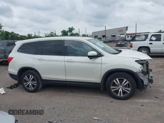 2018 Honda Pilot EX-L with VIN 5FNYF5H55JB016471, listed as a IAAI auction lot 42397519 with 102,482 mi miles and . Bid and sale history available at DreamBid. Image 14.