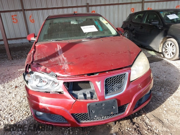 2009 Pontiac G6 1SB with VIN 1G2ZJ57KX94259078, listed as a IAAI auction lot 41223904 with 129,681 mi miles and . Bid and sale history available at DreamBid. Image 13.