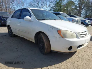 2004 Kia Spectra LX with VIN KNAFE121745036331, listed as a IAAI auction lot 41735613 with 67,634 mi miles. Bid and sale history available at carsss.com. Image 1.