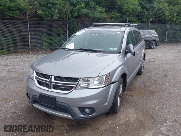 2017 Dodge Journey SXT with VIN 3C4PDDBG8HT577782, listed as a IAAI auction lot 42409731 with 136,618 mi miles and . Bid and sale history available at DreamBid. Image 16.