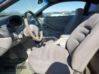 1997 Ford Mustang with VIN 1FALP404XVF156625, listed as a Copart auction lot 43497705 with 194,551 mi miles and Salvage Title. Bid and sale history available at carsss.com. Image 7.