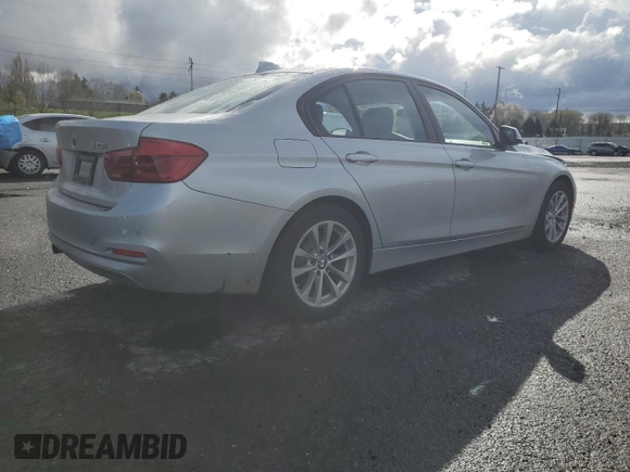 2018 BMW 3 Series 320i with VIN WBA8A9C57JAD27972, listed as a Copart auction lot 51279135 with 64,444 mi miles and Salvage title. Bid and sale history available at DreamBid. Image 3.