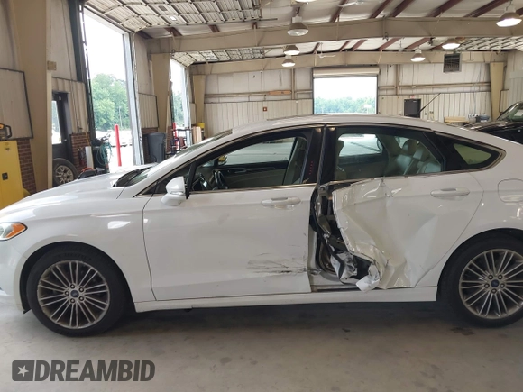 2014 Ford Fusion SE with VIN 3FA6P0HD8ER372731, listed as a IAAI auction lot 39915643 with 136,635 mi miles and . Bid and sale history available at DreamBid. Image 14.