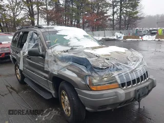 2000 Jeep Grand Cherokee Laredo with VIN 1J4GW48S1YC170303, listed as a IAAI auction lot 41582257 with 191,062 mi miles and . Bid and sale history available at DreamBid. Image 1.