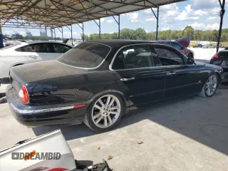 2004 Jaguar XJ с VIN SAJEA73B24TG10774, выставлен на аукционе Copart как лот 72577604 с пробегом 217 846 миль миль и Чистый • Clean title. История ставок и продаж доступна на DreamBid. Изображение 3.