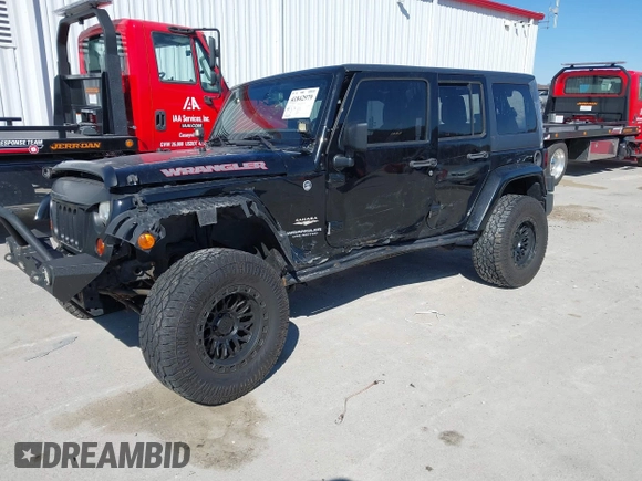 2013 Jeep Wrangler Unlimited Sahara with VIN 1C4BJWEG3DL617511, listed as a IAAI auction lot 41842979 with 149,980 mi miles and . Bid and sale history available at DreamBid. Image 2.