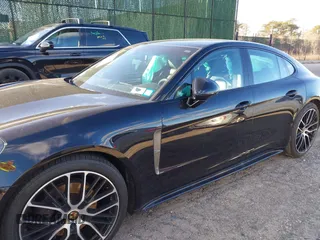 2023 Porsche Panamera with VIN WP0AJ2A77PL100226, listed as a IAAI auction lot 41554538 with 52,257 mi miles and . Bid and sale history available at DreamBid. Image 6.