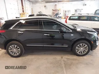 2019 Cadillac XT5 Luxury FWD z VIN 1GYKNCRS2KZ197052, wystawiony jako IAAI lot #42242466 z przebiegiem 86 678 mil mil oraz . Historia ofert i sprzedaży dostępna na DreamBid. Obrazek 13.