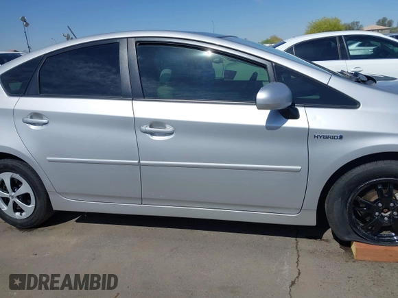 2015 Toyota Prius Four with VIN JTDKN3DU2F1899374, listed as a IAAI auction lot 42147786 with 136,787 mi miles and . Bid and sale history available at DreamBid. Image 13.