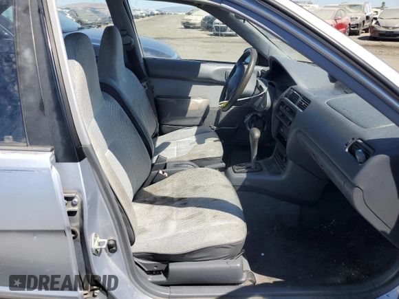 1995 Toyota Tercel DX z VIN JT2EL56E7S7011335, wystawiony jako Copart lot #67978774 z przebiegiem 182 025 mil mil oraz Szkoda całkowita • Salvage title. Historia ofert i sprzedaży dostępna na DreamBid. Obrazek 7.