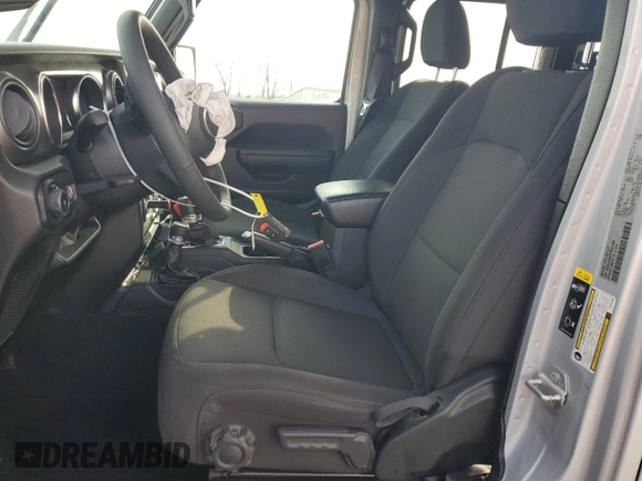 2023 Jeep Wrangler Willys with VIN 1C4HJXDG2PW671483, listed as a Copart auction lot 46990395 with 15,087 mi miles and Salvage Title. Bid and sale history available at DreamBid. Image 7.