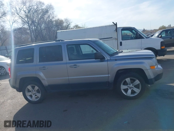 2016 Jeep Patriot High Altitude Edition with VIN 1C4NJRFB1GD712715, listed as a IAAI auction lot 41984245 with 124,227 mi miles. Bid and sale history available at carsss.com. Image 14.