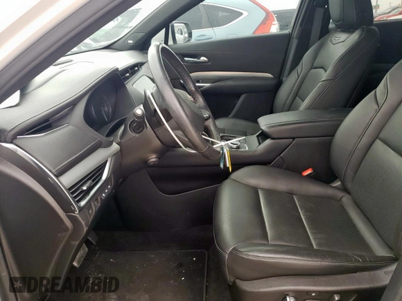 2023 Cadillac XT4 FWD Premium Luxury with VIN 1GYFZCR42PF110122, listed as a Copart auction lot 57332955 with 11,427 mi miles and Salvage title. Bid and sale history available at DreamBid. Image 7.