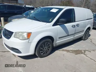 2014 Ram Cargo Van with VIN 2C4RRGAG9ER174194, listed as a IAAI auction lot 41785825 with 174,786 mi miles and . Bid and sale history available at DreamBid. Image 2.