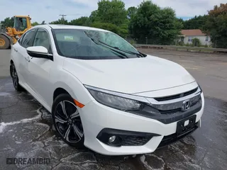 2017 Honda Civic Sedan Touring with VIN 19XFC1F99HE019808, listed as a IAAI auction lot 41894557 with 148,953 mi miles. Bid and sale history available at carsss.com. Image 1.