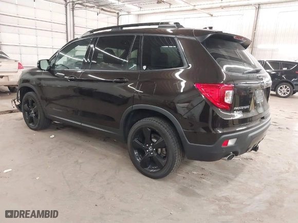 2020 Honda Passport Elite with VIN 5FNYF8H02LB010085, listed as a IAAI auction lot 41815080 with 79,343 mi miles. Bid and sale history available at carsss.com. Image 3.