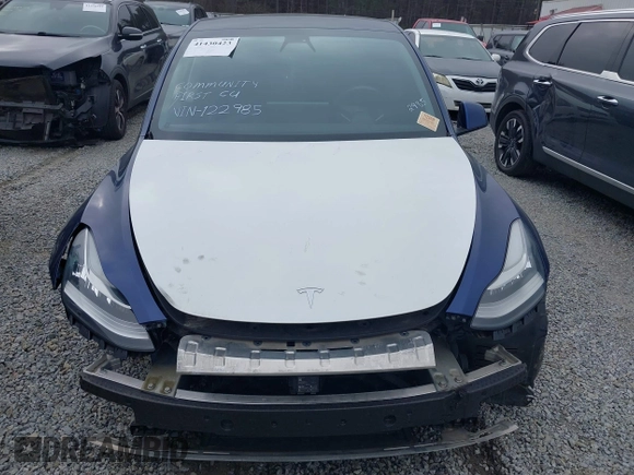 2021 Tesla Model Y Standard Range with VIN 5YJYGDED8MF122985, listed as a IAAI auction lot 41430423 with 120,302 mi miles and . Bid and sale history available at carsss.com. Image 11.