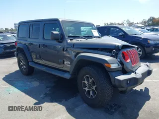 2020 Jeep Wrangler Unlimited Freedom with VIN 1C4HJXDG8LW338702, listed as a IAAI auction lot 42006692 with 48,389 mi miles and . Bid and sale history available at DreamBid. Image 1.