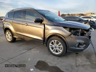 2017 Ford Escape SE with VIN 1FMCU0G91HUE07265, listed as a Copart auction lot 84231444 with 82,990 mi miles and Clean Title. Bid and sale history available at DreamBid. Image 4.