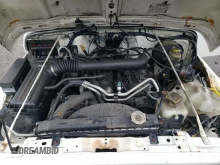 2006 Jeep Wrangler X z VIN 1J4FA39S56P742837, wystawiony jako Copart lot #58166415 z przebiegiem 97 224 mil mil oraz Szkoda całkowita • Salvage title. Historia ofert i sprzedaży dostępna na DreamBid. Obrazek 11.