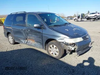 2003 Honda Odyssey EX-L with VIN 5FNRL18993B039943, listed as a IAAI auction lot 41742829 with 227,581 mi miles and . Bid and sale history available at DreamBid. Image 1.