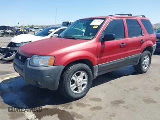 2003 Ford Escape XLT Popular 2 with VIN 1FMYU93123KB02310, listed as a IAAI auction lot 41975073 with 169,864 mi miles. Bid and sale history available at carsss.com. Image 17.