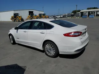 2013 Ford Fusion SE Hybrid z VIN 3FA6P0LU6DR325719, wystawiony jako Copart lot #55777715 z przebiegiem 152 478 mil mil oraz Szkoda całkowita • Salvage title. Historia ofert i sprzedaży dostępna na DreamBid. Obrazek 2.