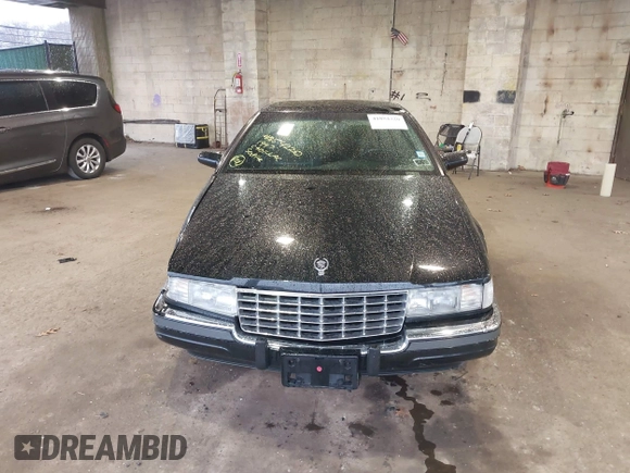 1997 Cadillac Seville Luxury SLS with VIN 1G6KS52YXVU816736, listed as a IAAI auction lot 41854220 with 107,091 mi miles. Bid and sale history available at carsss.com. Image 12.