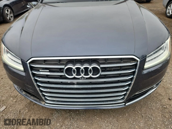 2015 Audi A8 4.0T with VIN WAUJ2AFD6FN011009, listed as a Copart auction lot 64173005 with 153,377 mi miles and Salvage title. Bid and sale history available at DreamBid. Image 11.