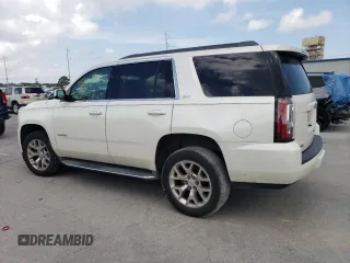 2015 GMC Yukon SLT z VIN 1GKS1BKC4FR552523, wystawiony jako Copart lot #54658135 z przebiegiem 93 907 mil mil oraz Czysty tytuł • Clean title. Historia ofert i sprzedaży dostępna na DreamBid. Obrazek 2.