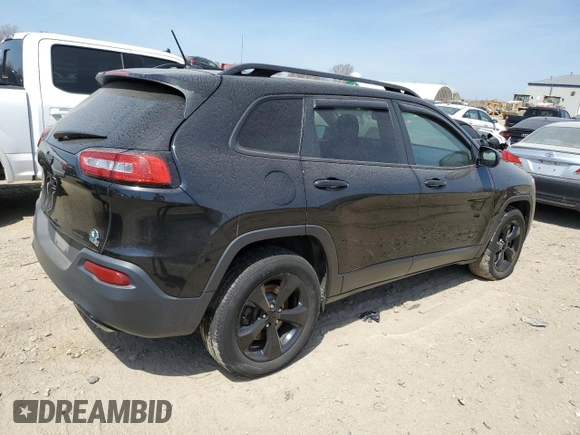 2015 Jeep Cherokee North with VIN 1C4PJMCS7FW750727, listed as a Copart auction lot 54077855 with 242,449 mi miles and Clean Title. Bid and sale history available at carsss.com. Image 3.