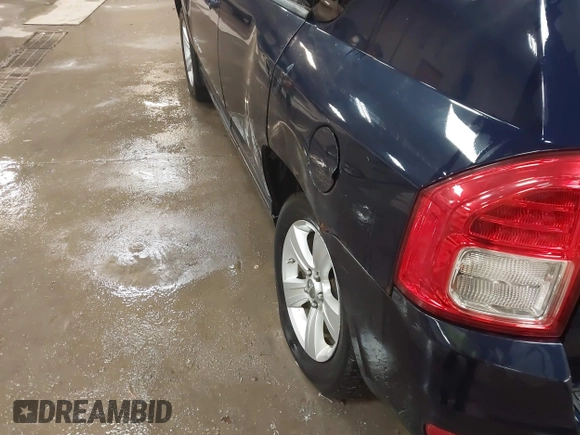 2012 Jeep Compass Latitude with VIN 1C4NJDEB8CD588277, listed as a IAAI auction lot 41511408 with 114,965 mi miles. Bid and sale history available at carsss.com. Image 6.
