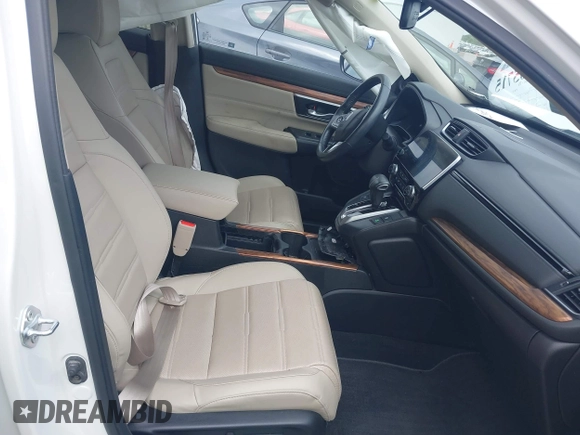 2021 Honda CR-V Touring with VIN 5J6RW2H93ML012016, listed as a IAAI auction lot 42365715 with 55,114 mi miles and . Bid and sale history available at DreamBid. Image 5.