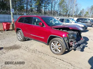 2013 Jeep Grand Cherokee Laredo with VIN 1C4RJEAG3DC631987, listed as a IAAI auction lot 41240182 with 186,193 mi miles. Bid and sale history available at carsss.com. Image 1.