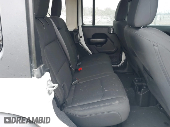 2019 Jeep Wrangler Unlimited Sport Altitude with VIN 1C4HJXDG3KW528647, listed as a IAAI auction lot 40986538 with 85,381 mi miles and . Bid and sale history available at DreamBid. Image 8.