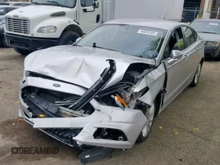 2016 Ford Fusion SE Hybrid with VIN 3FA6P0LUXGR397589, listed as a Copart auction lot 58180612 with 72,400 mi miles and Salvage Title. Bid and sale history available at carsss.com. Image 2.