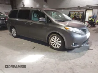 2011 Toyota Sienna XLE with VIN 5TDDK3DC8BS026606, listed as a IAAI auction lot 41295760 with 128,930 mi miles. Bid and sale history available at carsss.com. Image 1.