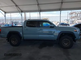 2022 Toyota Tacoma SR with VIN 3TMCZ5ANXNM479025, listed as a IAAI auction lot 42280363 with 29,650 mi miles and . Bid and sale history available at DreamBid. Image 13.