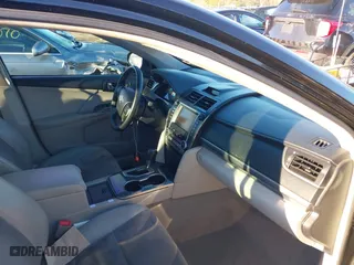 2012 Toyota Camry Hybrid XLE with VIN 4T1BD1FK3CU030064, listed as a IAAI auction lot 41872634 with 373,897 mi miles. Bid and sale history available at carsss.com. Image 5.