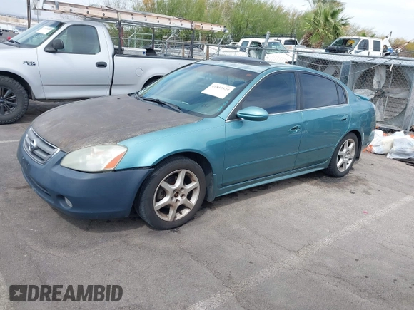 2003 Nissan Altima SE z VIN 1N4BL11D63C282757, wystawiony jako IAAI lot #41859329 z przebiegiem 218 391 mil mil oraz . Historia ofert i sprzedaży dostępna na DreamBid. Obrazek 2.