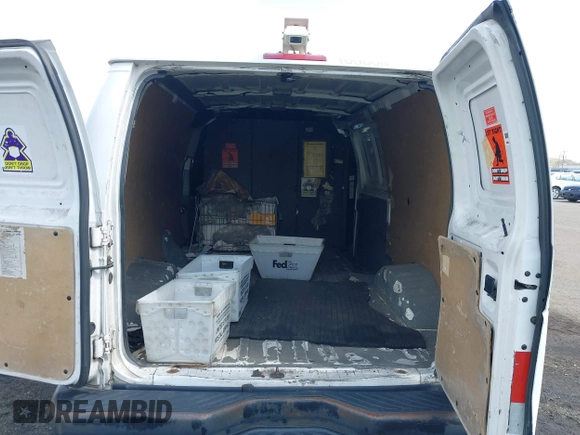 2010 Ford Econoline Cargo Commercial with VIN 1FTNE1EW8ADA91801, listed as a IAAI auction lot 41940231 with 201,516 mi miles and . Bid and sale history available at carsss.com. Image 8.